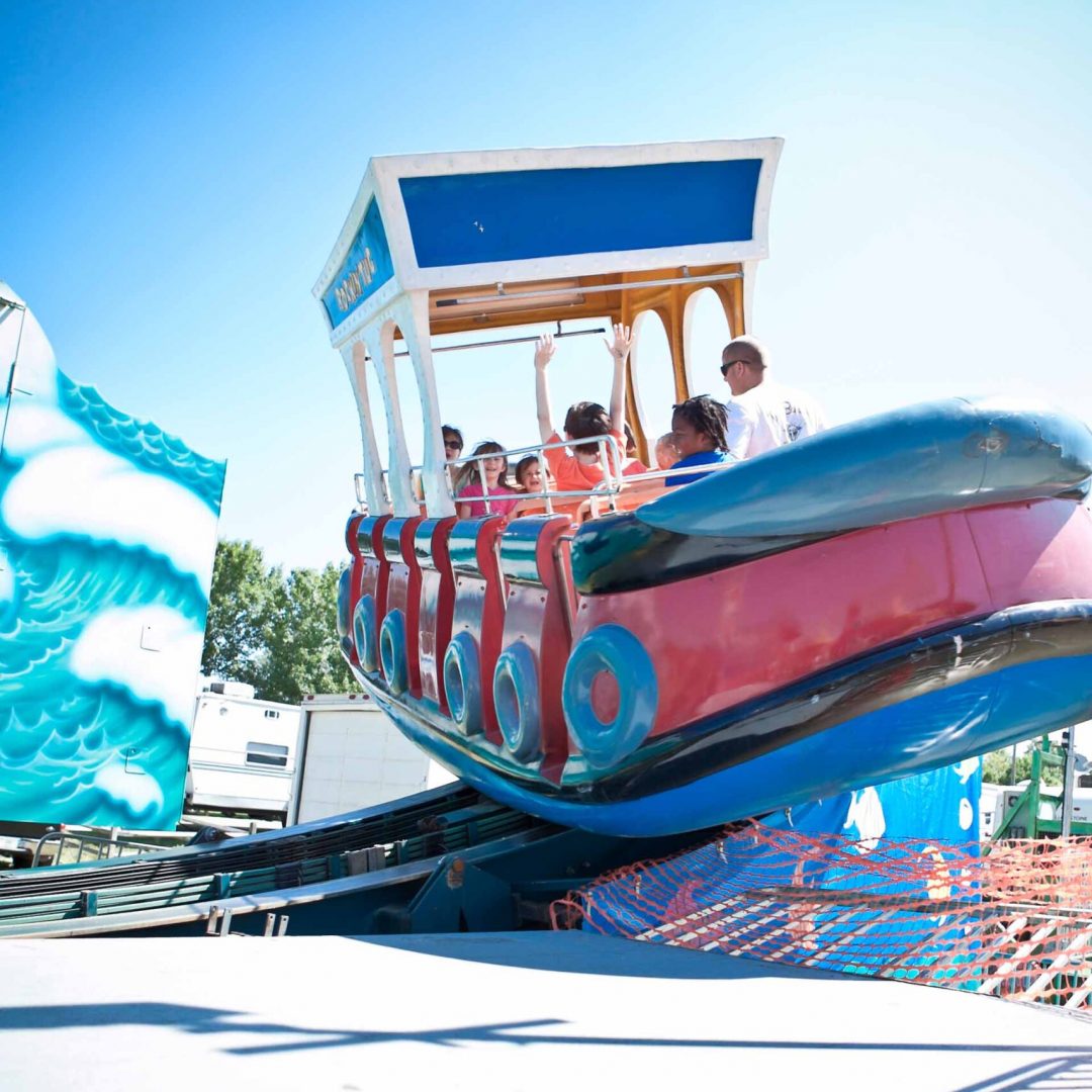 People on Carnival Ride at the Chesapeake Jubilee | Chesapeake Economic Development